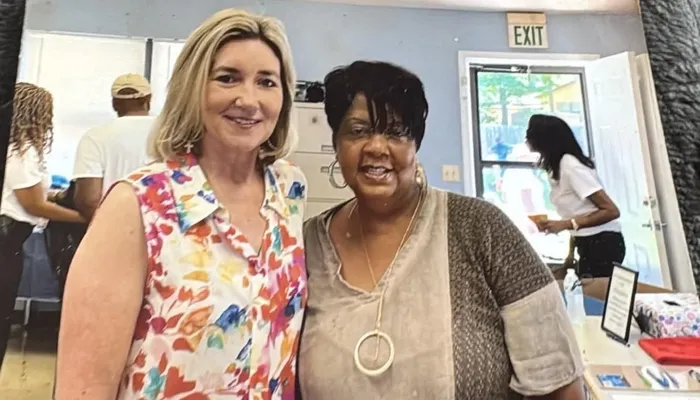 Founder Shernavian Roper Vandiber (right) with a community partner